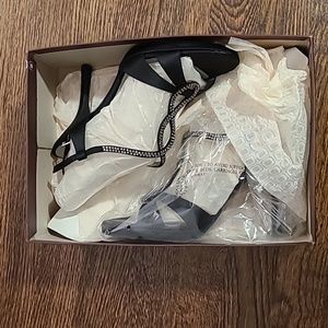 Beautiful and Sexy Bandolino Black satin strappy heel, size 8.5, new with box.